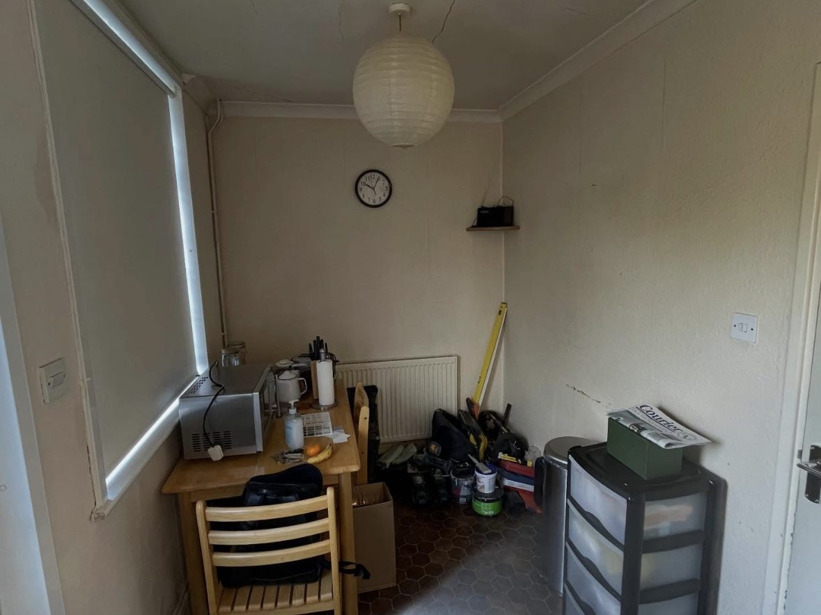 Dining room before — cluttered