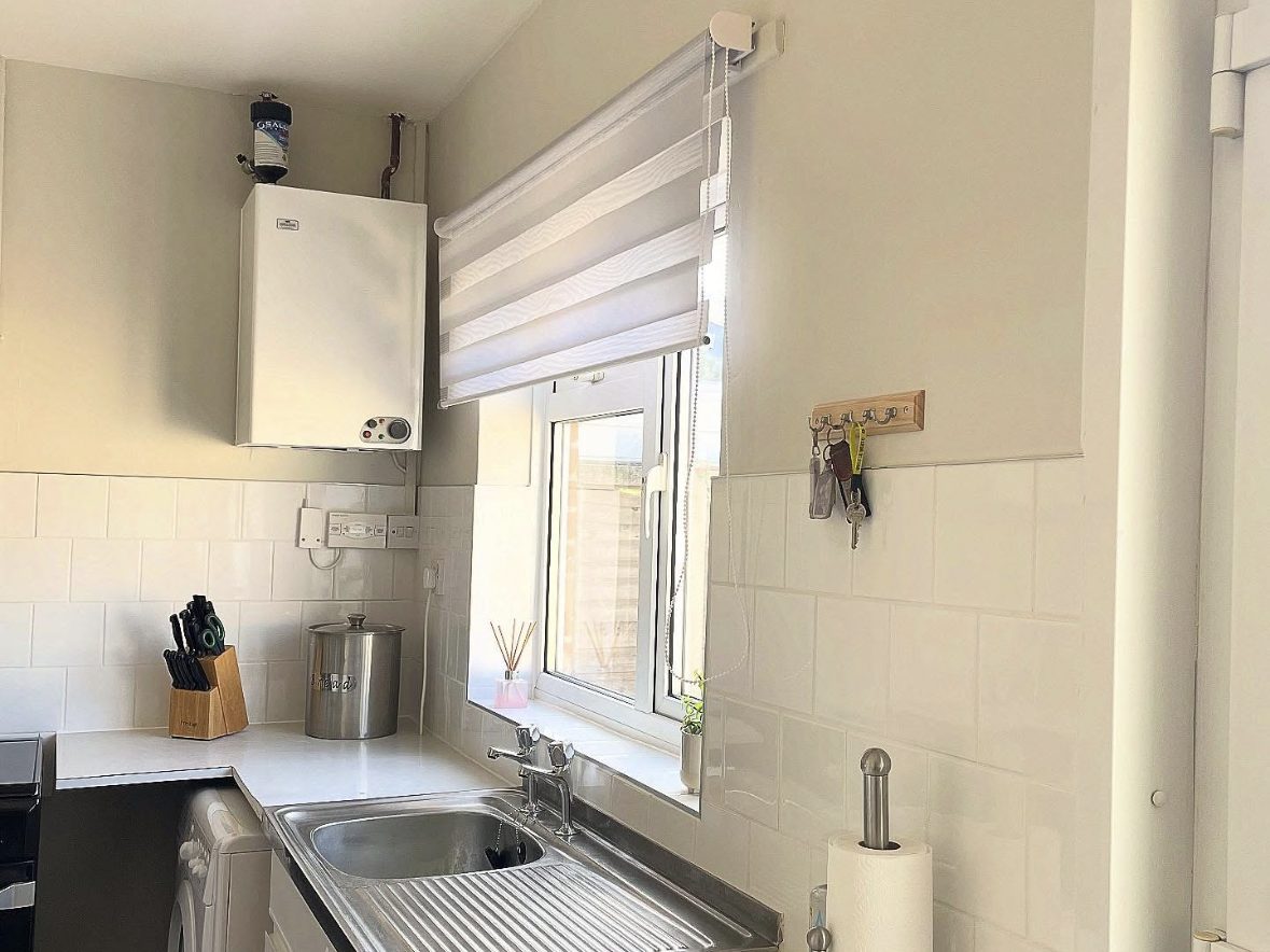 Kitchen with new metro tile splashback